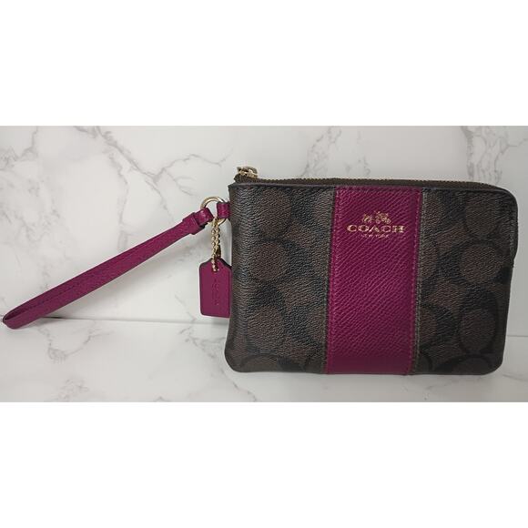 COACH Corner Zip Wristlet in Signature Canvas with Pink Accents - EUC - Picture 1 of 6